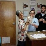 Dr. Brenner and volunteer students from USF serving a grateful resident